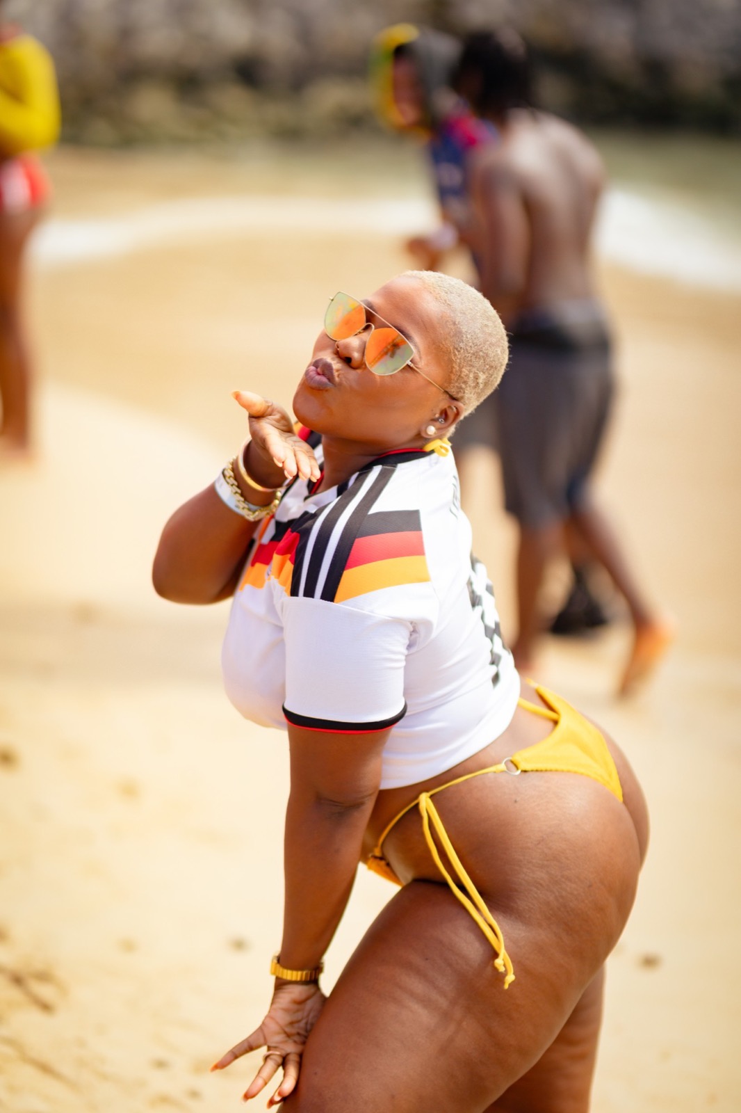 Blowing a kiss on the beach
